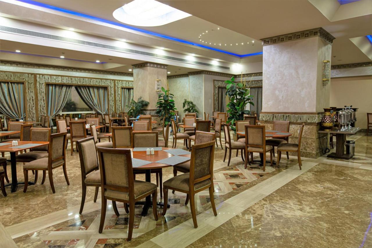 Triumph Plaza Hotel Кайро Екстериор снимка