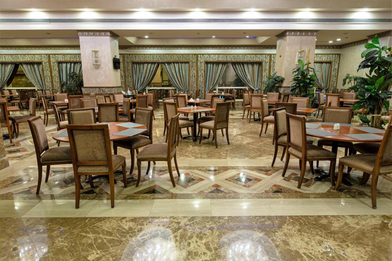 Triumph Plaza Hotel Кайро Екстериор снимка