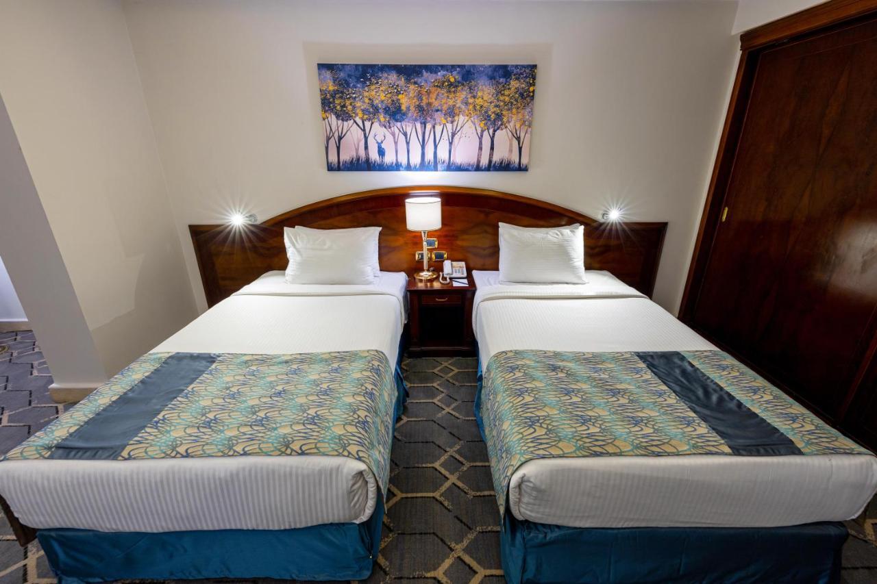 Triumph Plaza Hotel Кайро Екстериор снимка