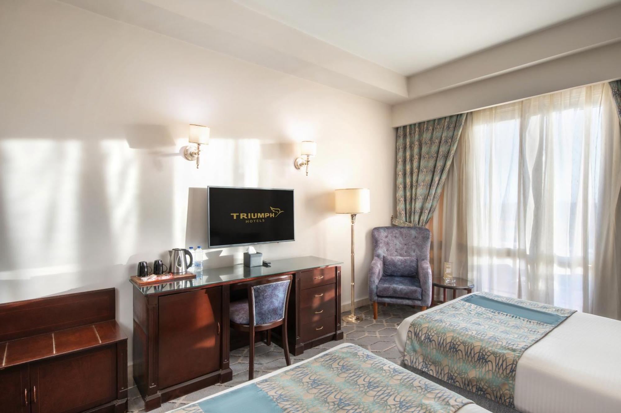 Triumph Plaza Hotel Кайро Стая снимка