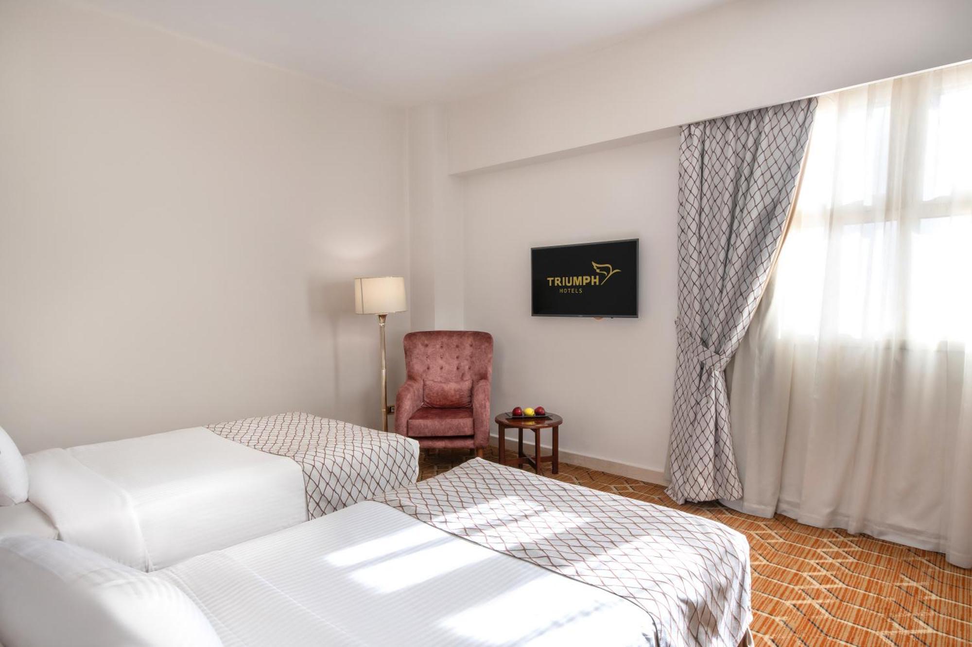 Triumph Plaza Hotel Кайро Стая снимка